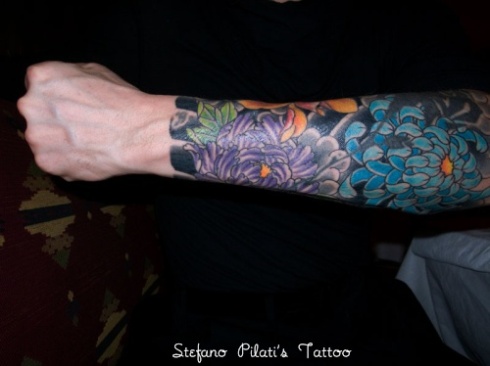 amazing arm sleeve tattoo
